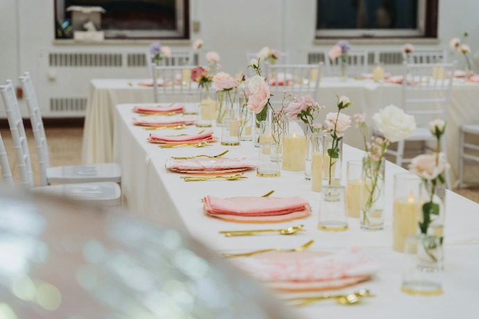 A long dining table set for an event